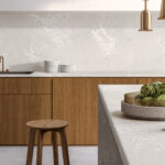 modern kitchen with white veined island and counters