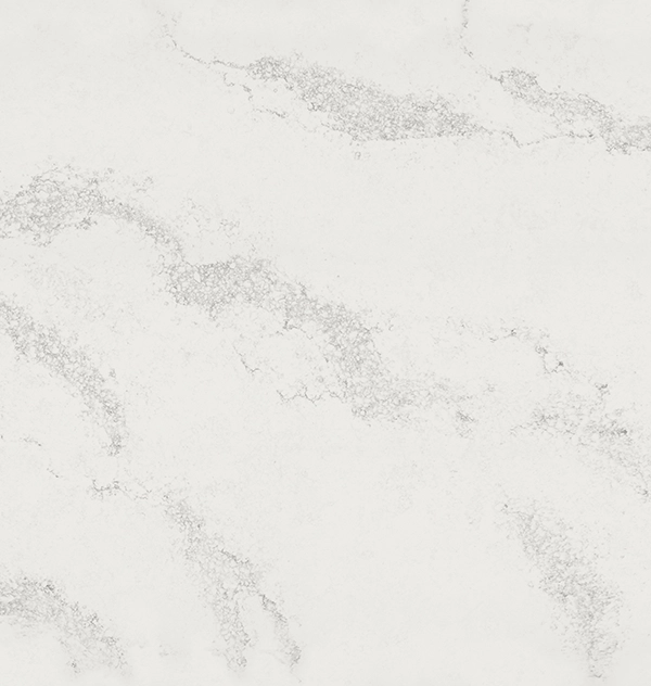 White marble surface with subtle gray veining and natural texture patterns.