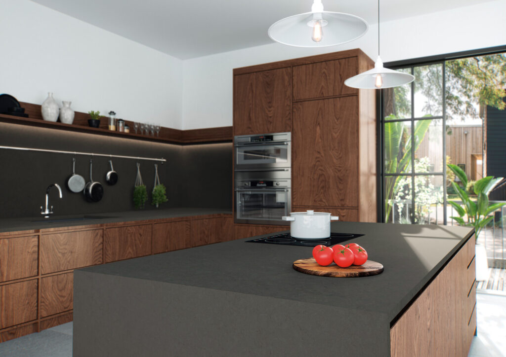 Dark brown kitchen with black backsplash and island countertop 