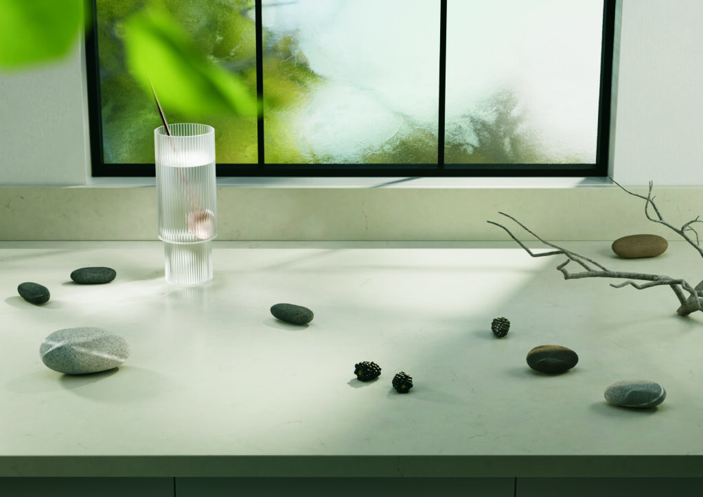 grey counter with pebbles and glass 
