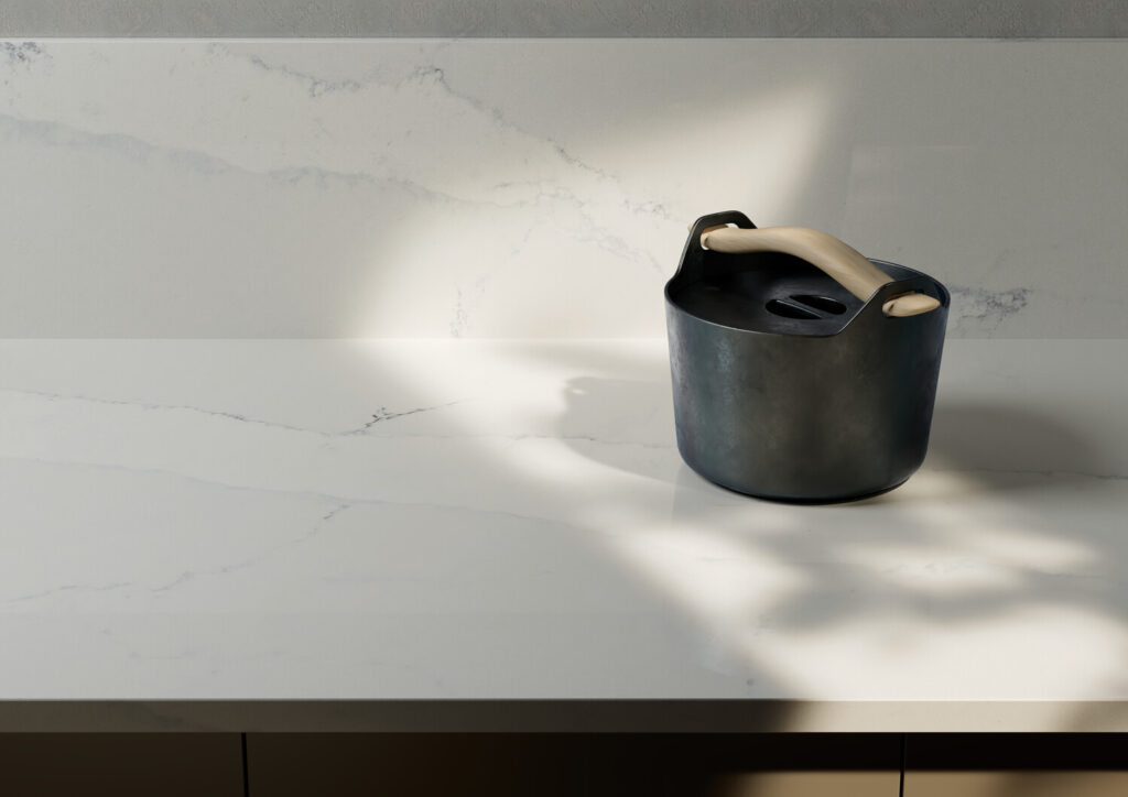 veined white counter with pot
