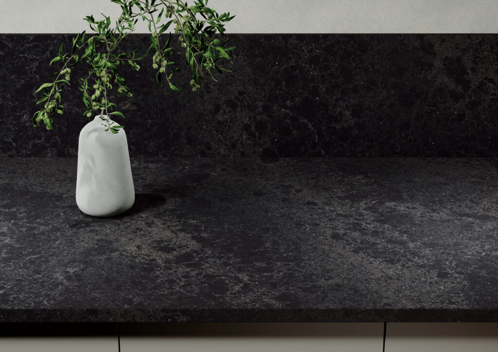 black veined countertop with plant