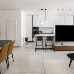 Caesarstone porcelain 504 Lumena surface in a modern kitchen with island design by Revital Marciano photography Ido Ganor