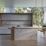 Caesarstone porcelain 506 Mirabel surface in Modern kitchen with marble island, bar stools, large windows, and lush green outdoor view.