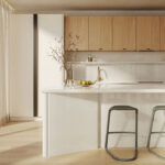 Caesarstone 5110 Alpine Mist in Modern kitchen with white island, wooden cabinets, three stools, large window, and minimalist decor.