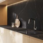 Caesarstone porcelain 511 Smokestone dark surface in modern one wall kitchen with island