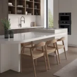 Modern kitchen with white Caesarstone 6141 Ocean Foam island, wooden chairs, built-in oven, open shelves, and large window.